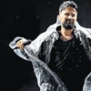 Tarkan-hayranligi-yagmura-karsi-direndi-featured
