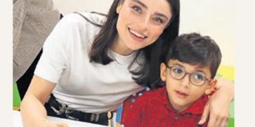 Cocuklarla-birlikte-yesil-kurdeleler-yapti-featured